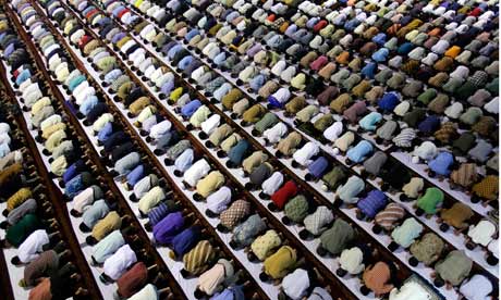 Photograph: Jewel Samad/AFP/Getty Images; Description: Standard behaviours in early evolution can be seen as the precursor to ritualised religion. Photograph: Jewel Samad/AFP/Getty Images; Description: Standard behaviours in early evolution can be seen as the precursor to ritualised religion.