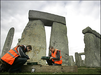 Archaeology students Sam Ferguson, left, and Steve Bush sift through earth at the English site. (By Kirsty Wigglesworth -- Associated Press)