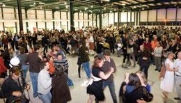 Photo credit: C. MARCELLONI/CERN; description: Like a giant commune, members of the ATLAS collaboration work, eat and party together. Photo credit: C. MARCELLONI/CERN; description: Like a giant commune, members of the ATLAS collaboration work, eat and party together.