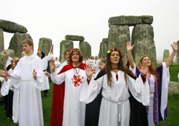 Photograph of people in a religious ceremony at Stonehenge