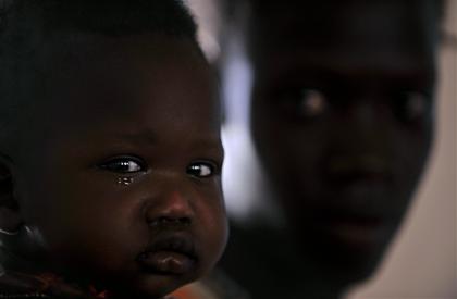 Photo credit: Roberto Schmidt, AFP/Getty Images; Description: child and mother in Africa Photo credit: Roberto Schmidt, AFP/Getty Images; Description: child and mother in Africa