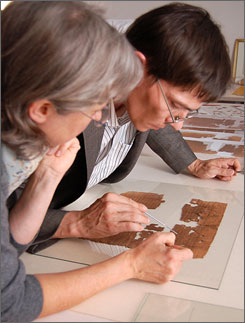 photo: Florence Darbre observes researcher Gregor Wurst's careful inspection of the ancient codex. credit: Cheryl R. Zook, NGT photo: Florence Darbre observes researcher Gregor Wurst's careful inspection of the ancient codex. credit: Cheryl R. Zook, NGT