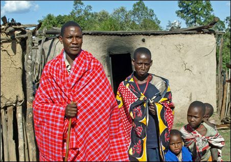 Photo credit: MinnPost photo by Sharon Schmickle; Description: Edward and Nomesenyik Kosen at home with their children. Photo credit: MinnPost photo by Sharon Schmickle; Description: Edward and Nomesenyik Kosen at home with their children.