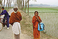 Photograph by Tom Haley/Sipa Press; Description: Group Danone got creative in Bangladesh, given the country's lack of refrigeration. It built localized microplants and outfitted salespeople with cooler bags. Photograph by Tom Haley/Sipa Press; Description: Group Danone got creative in Bangladesh, given the country's lack of refrigeration. It built localized microplants and outfitted salespeople with cooler bags.